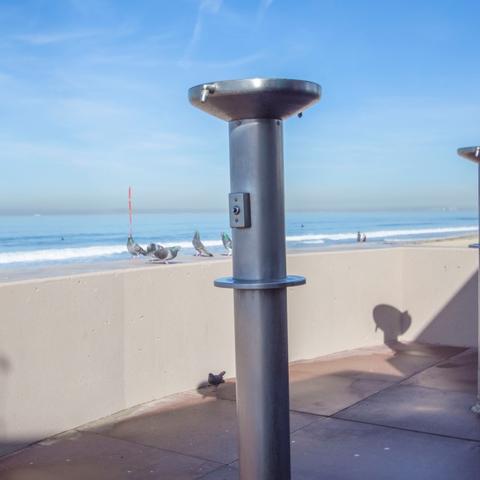Public beach outdoor showers at Portwood Pier Plaza at the Port of San Diego
