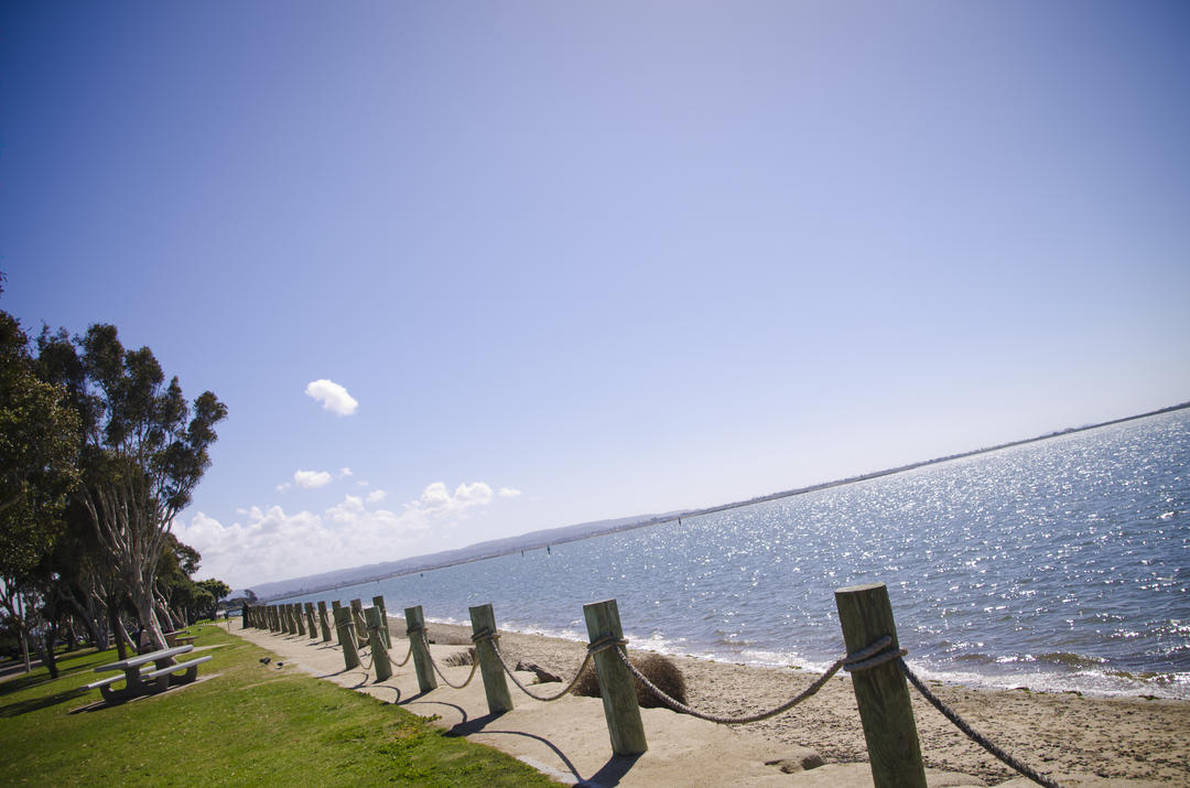 View of the blue sky and the blue water of San Diego Bay from Chula Vista Bayfront Park.
