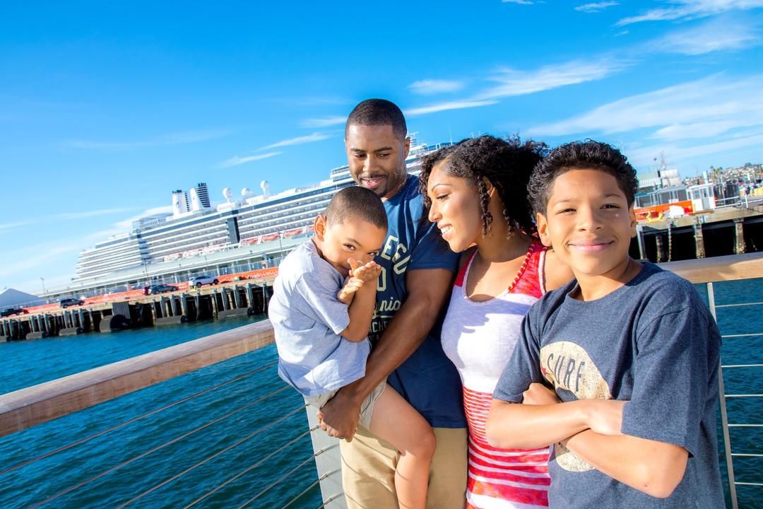 a family of four enjoys a sunny day at the Embarcadero at the Port of San Diego