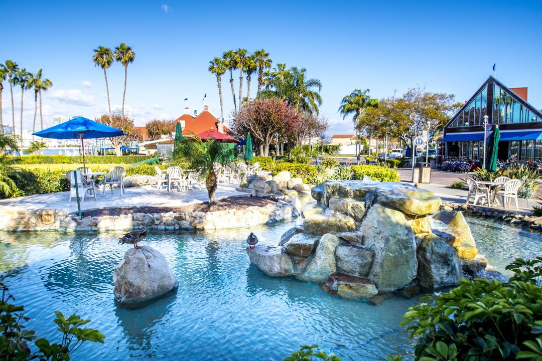 a fountain bubbles in a courtyard at Coronado Ferry Landing