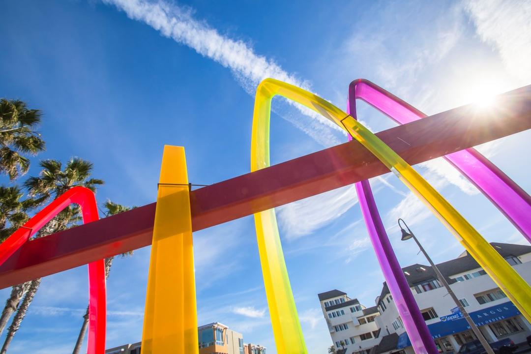 Worm's-eye-view of Surfhenge acrylic sculpture by Malcolm Jones at Portwood Pier Plaza at the Port of San Diego