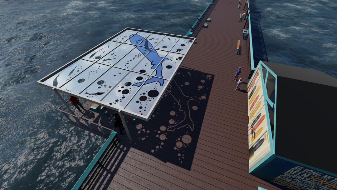 Rendering of a shade canopy in a shark and water design over the pier extension at mid-pier just across from the public restrooms.
