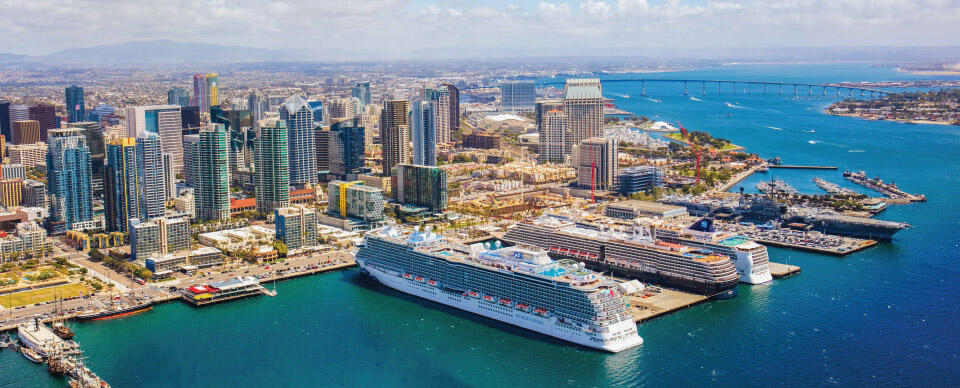 an aerial view of Downtown San Diego and a cruise ship in Port
