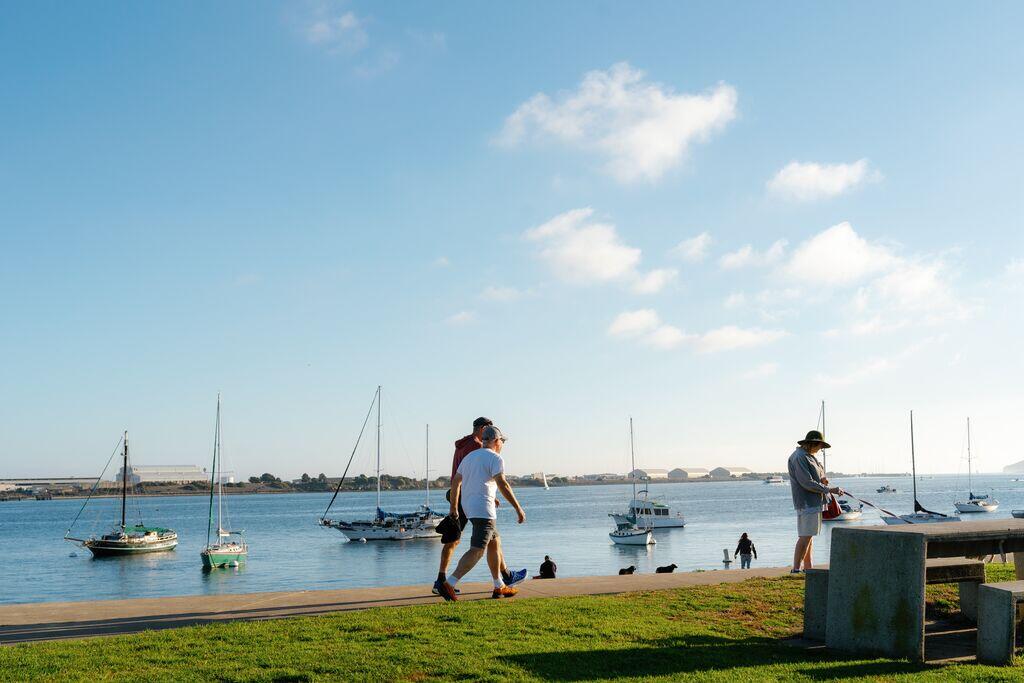 People walking along Shelter Island Shoreline Park