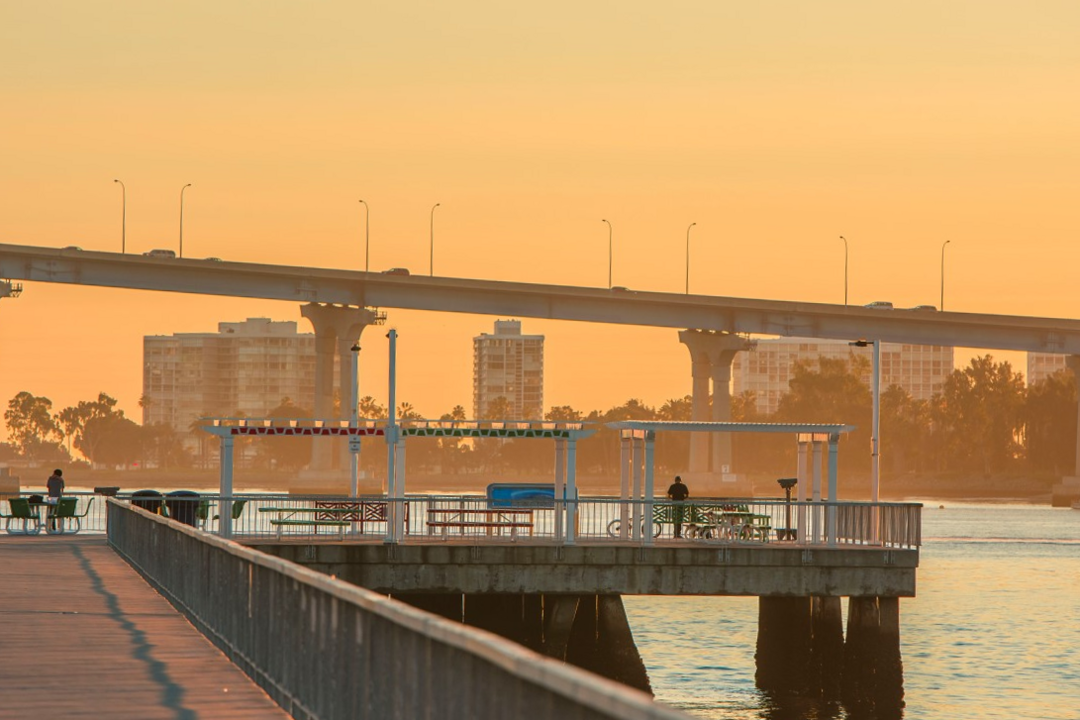 Beautiful view of the Coronado Bridge and waterfront from the recreational pier at Cesar Chavez Park at the Port of San Diego