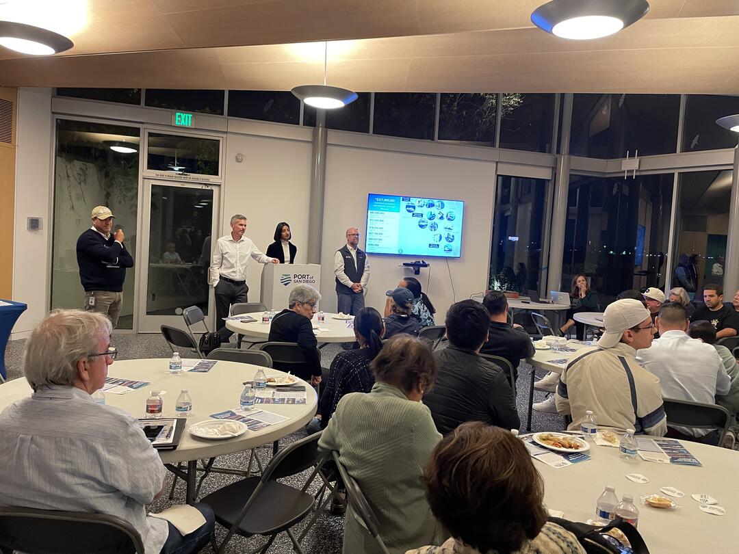 Port employees stand before community members and take questions about the Maritime Clean Air Strategy.