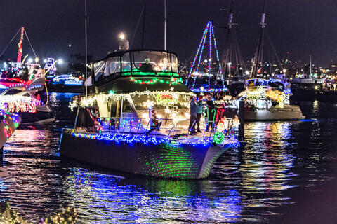A boat at the Port of San Diego's Parade of Lights is lit.