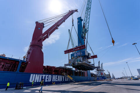 Image of one of the Port of San Diego's new all-electric Gottwald Generation 6 Mobile Harbor Cranes from Konecranes being offloaded at the Tenth Avenue Marine Terminal.