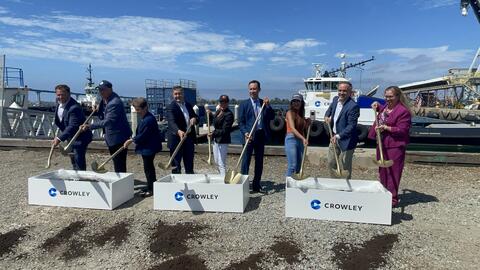 Group photo of ceremonial groundbreaking for Crowley's eTug charging station in August 2023