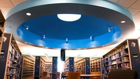 Book shelves inside of Logan Heights Library