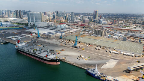 A large cargo ship docked at the Tenth Avenue Marine Terminal