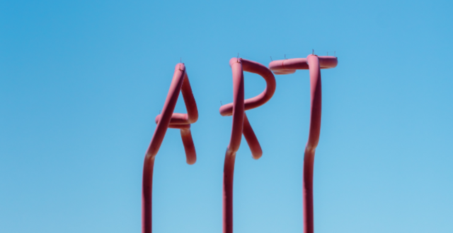 red pipes spell out "ART" in Imperial beach