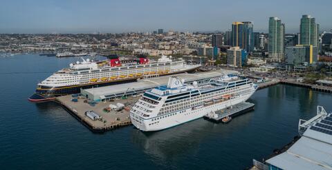 Two cruise ships plugged into shore power at Port of San Diego B Street Terminal.