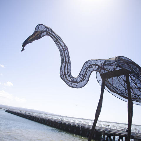 Inspired by the beauty and majesty of the Great Egret, this 13-foot tall sculpture pays homage to the noble bird. Constructed of expanded metal to give a feeling of feathers and airiness, the tree casts interesting patterns on the ground and on visitors who stand under its partially outstretched wings.
