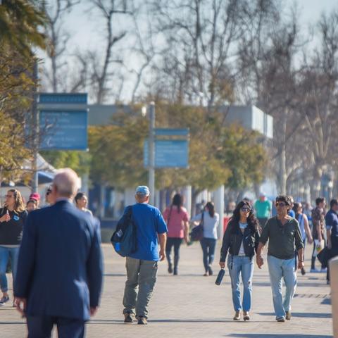 People walking along Broadway Plaza at the Port of San Diego