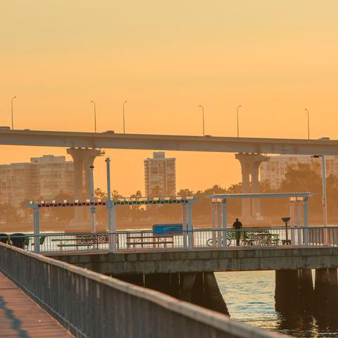 Beautiful view of the Coronado Bridge and waterfront from the recreational pier at Cesar Chavez Park at the Port of San Diego