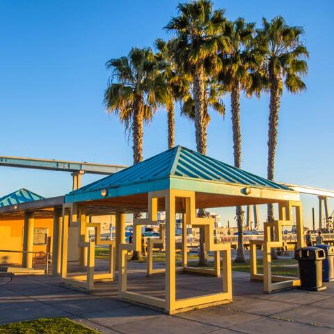 Gazebo, trees, and view of Coronado Bridge at Port Park in Barrio Logan at the Port of San Diego
