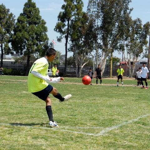 Kids playing soccer at Cesar Chavez Park at the Port of San Diego