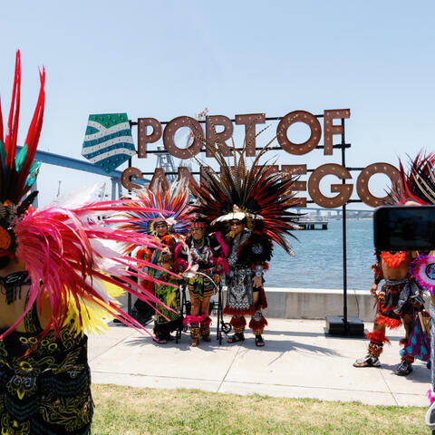 Dancers in colorful traditional dance at the park