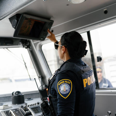 a person pilots the Harbor Police boat