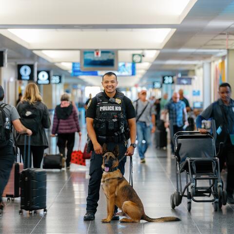 a Harbor Police K9 officer and handler on duty at the airport