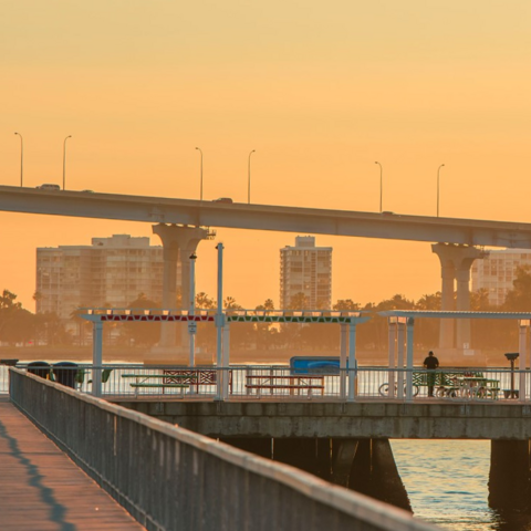 Beautiful view of the Coronado Bridge and waterfront from the recreational pier at Cesar Chavez Park at the Port of San Diego