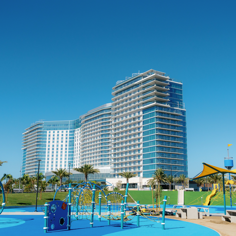 Image of new yellow and blue playground equipment in Harbor Park on Chula Vista Bayfront.